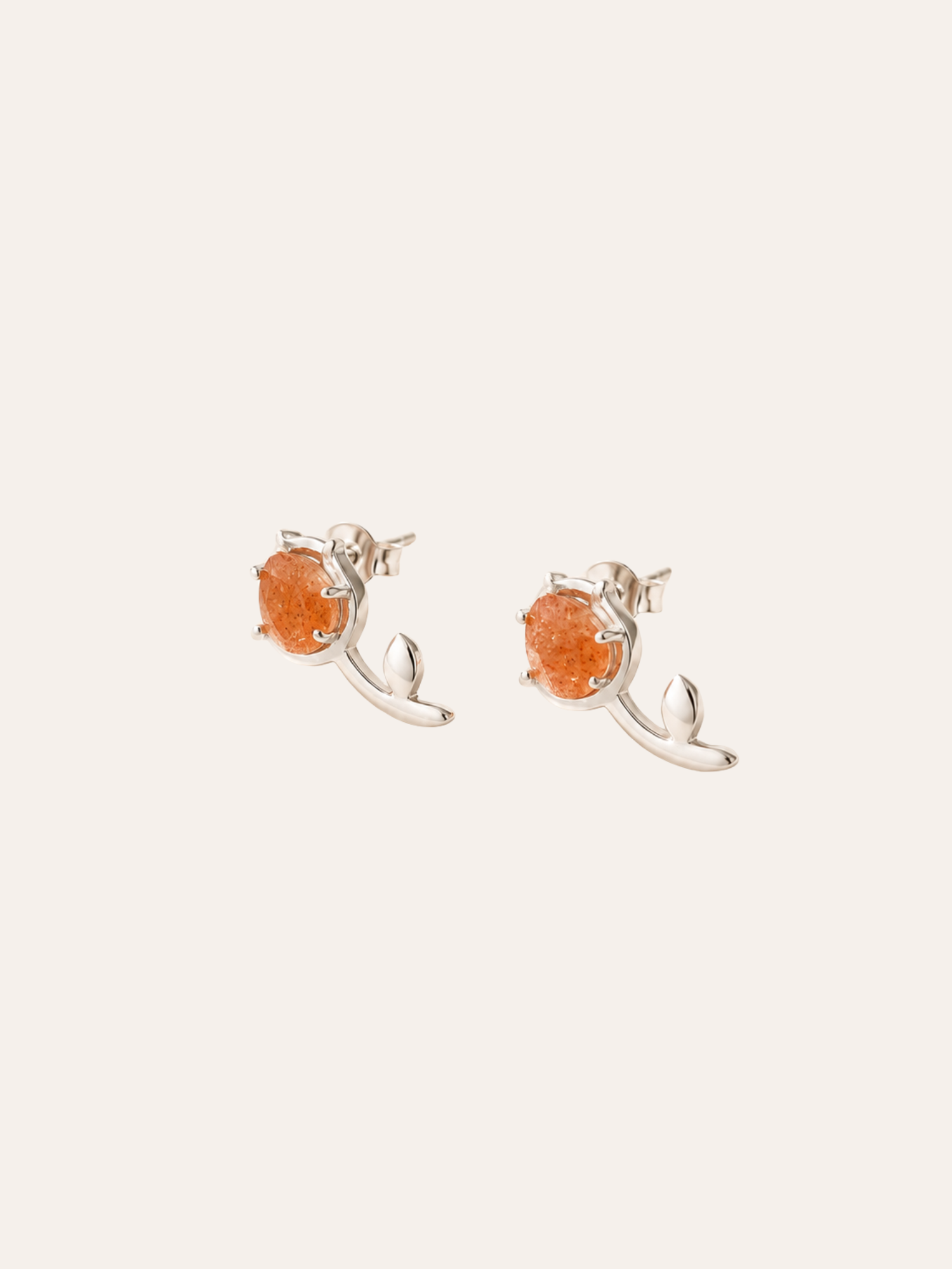 Sunstone Tulip Stud Earrings in evening light on dark velvet