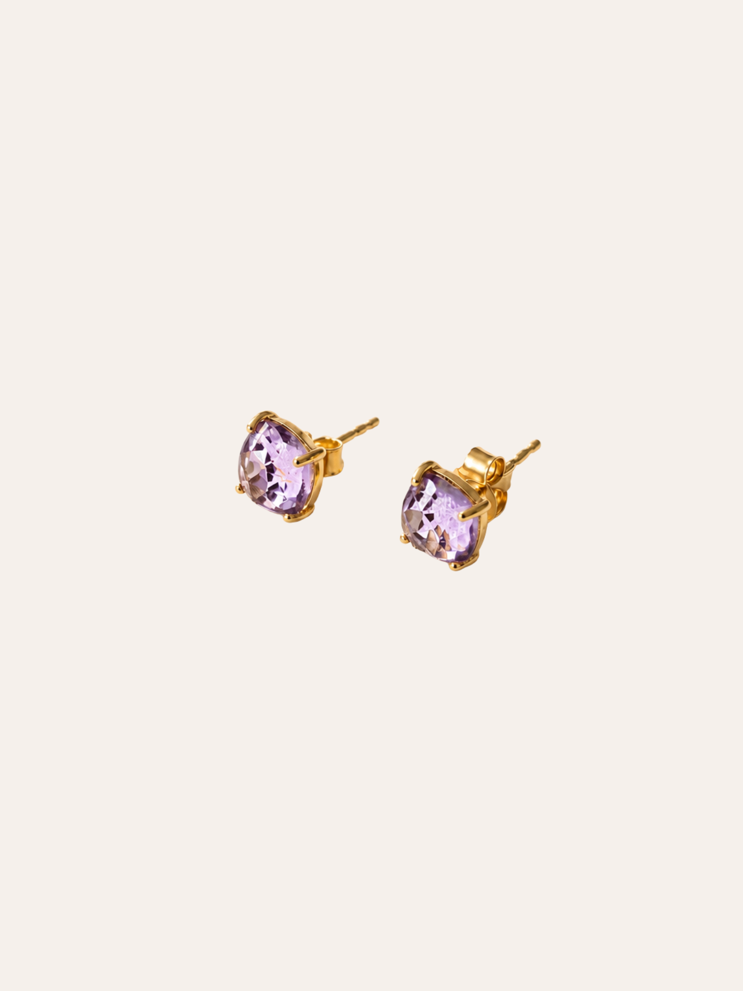 Amethyst Square Stud Earrings in evening light on dark velvet