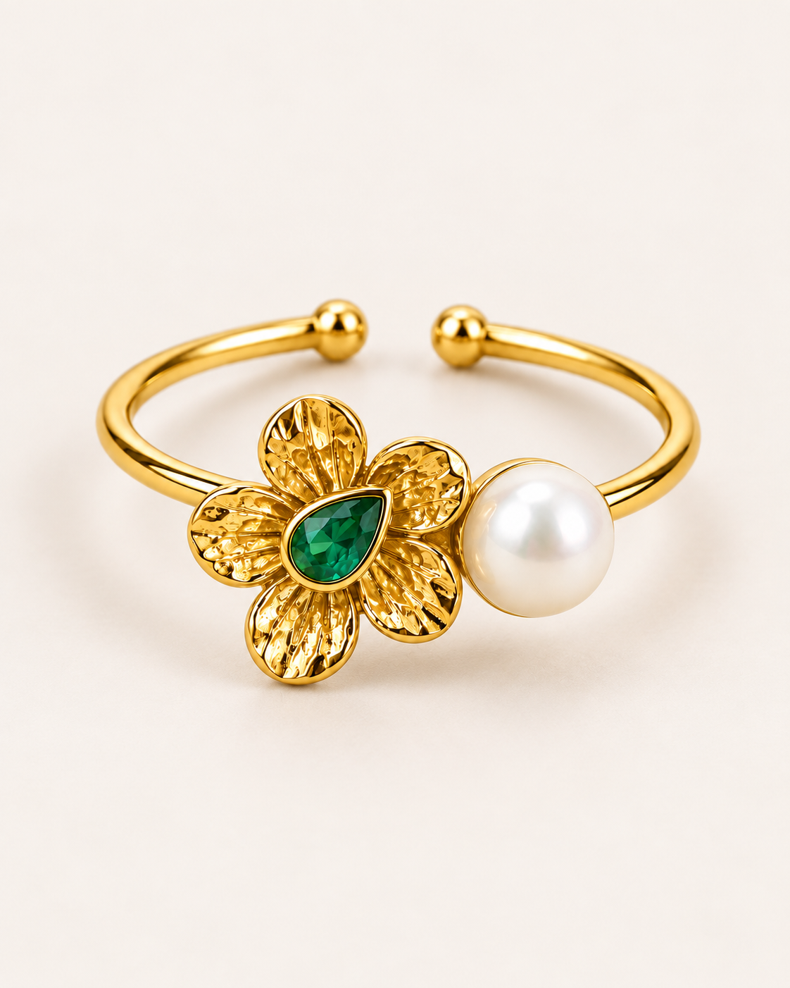 Pearl Bloom Ring in gold tone stainless steel, adjustable open band with a flower and a pearl