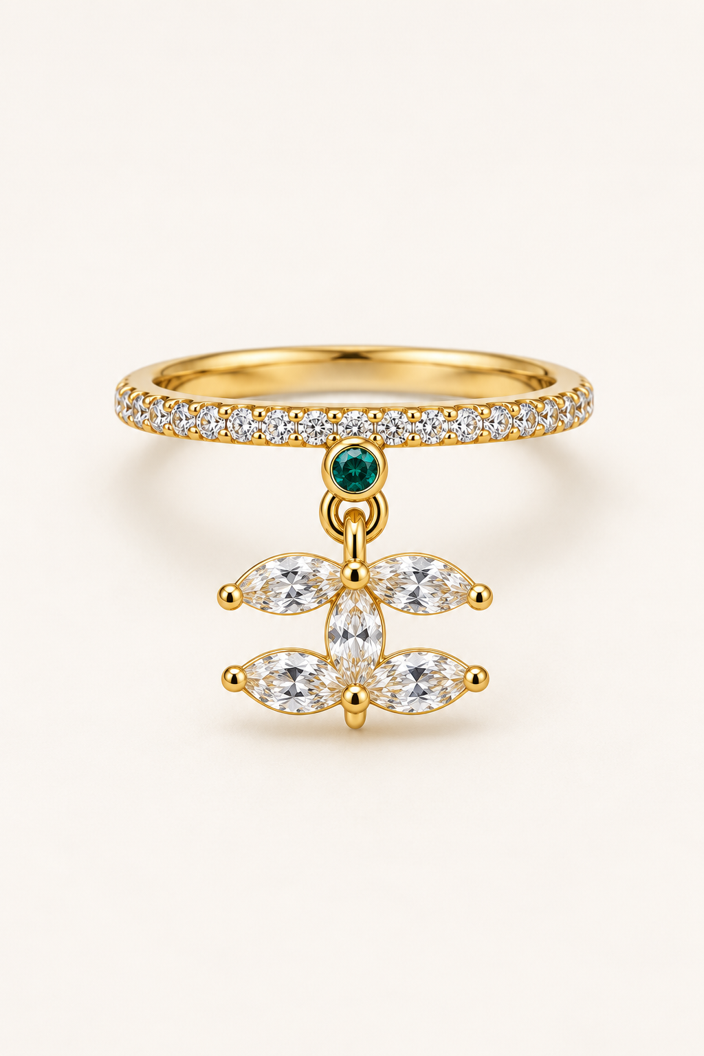 Lotus Drop Ring, gold tone steel pave ring with a movable lotus charm
