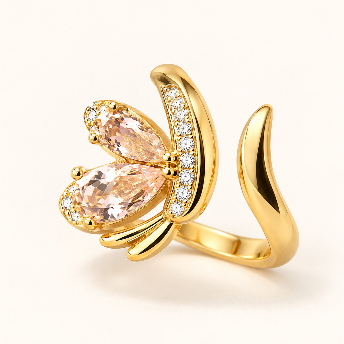 Sweet Pea Ring detail, peach pear cuts set open beside a row of small clear stones