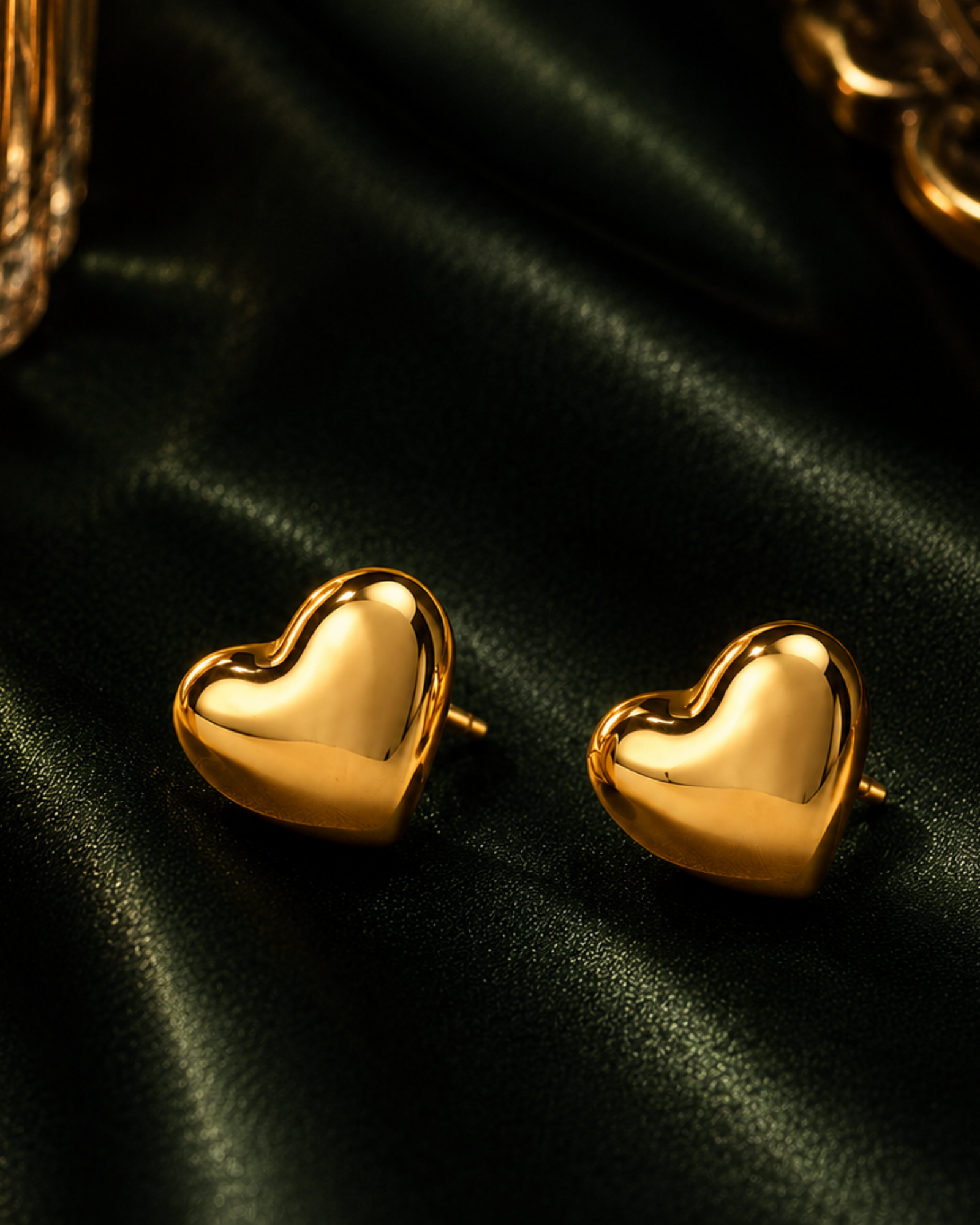 Golden Heart Ear Cuff in 18K gold vermeil 925 sterling silver, ivory background daylight shot