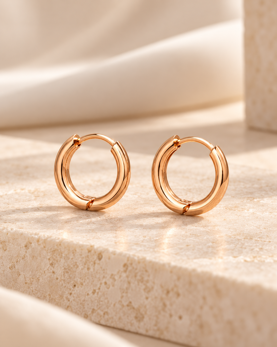 Amaraeth Classic Huggie Hoop Earrings, smooth gold tone with hinge closure