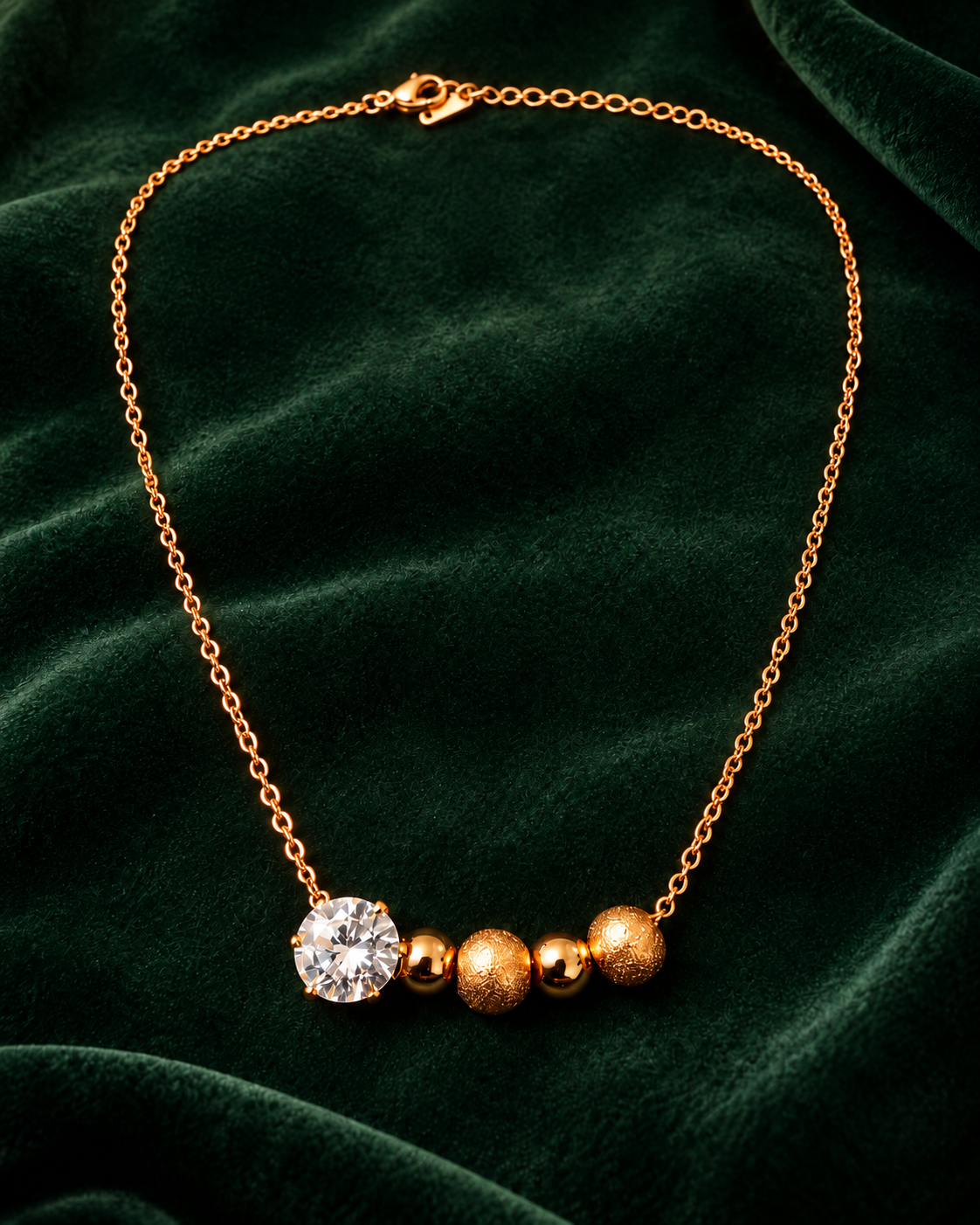Solitaire Bead Necklace, gold tone stainless steel with a large clear stone and four beads