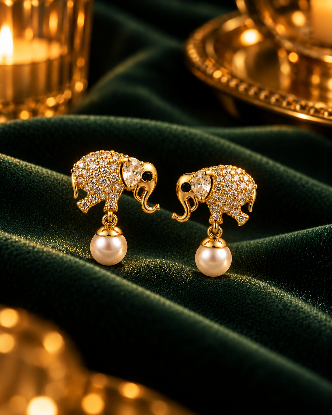 Elephant Drop Earrings, pavé set cubic zirconia with a faux pearl drop in gold tone stainless steel