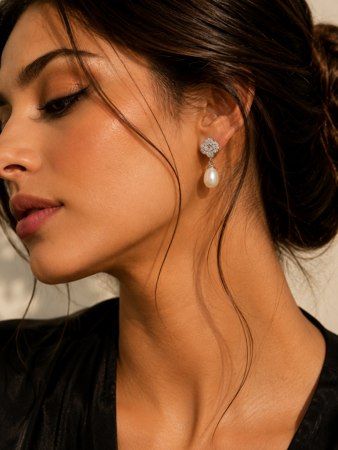 Pearl Drop Earrings close-up of pearl drop and CZ top setting