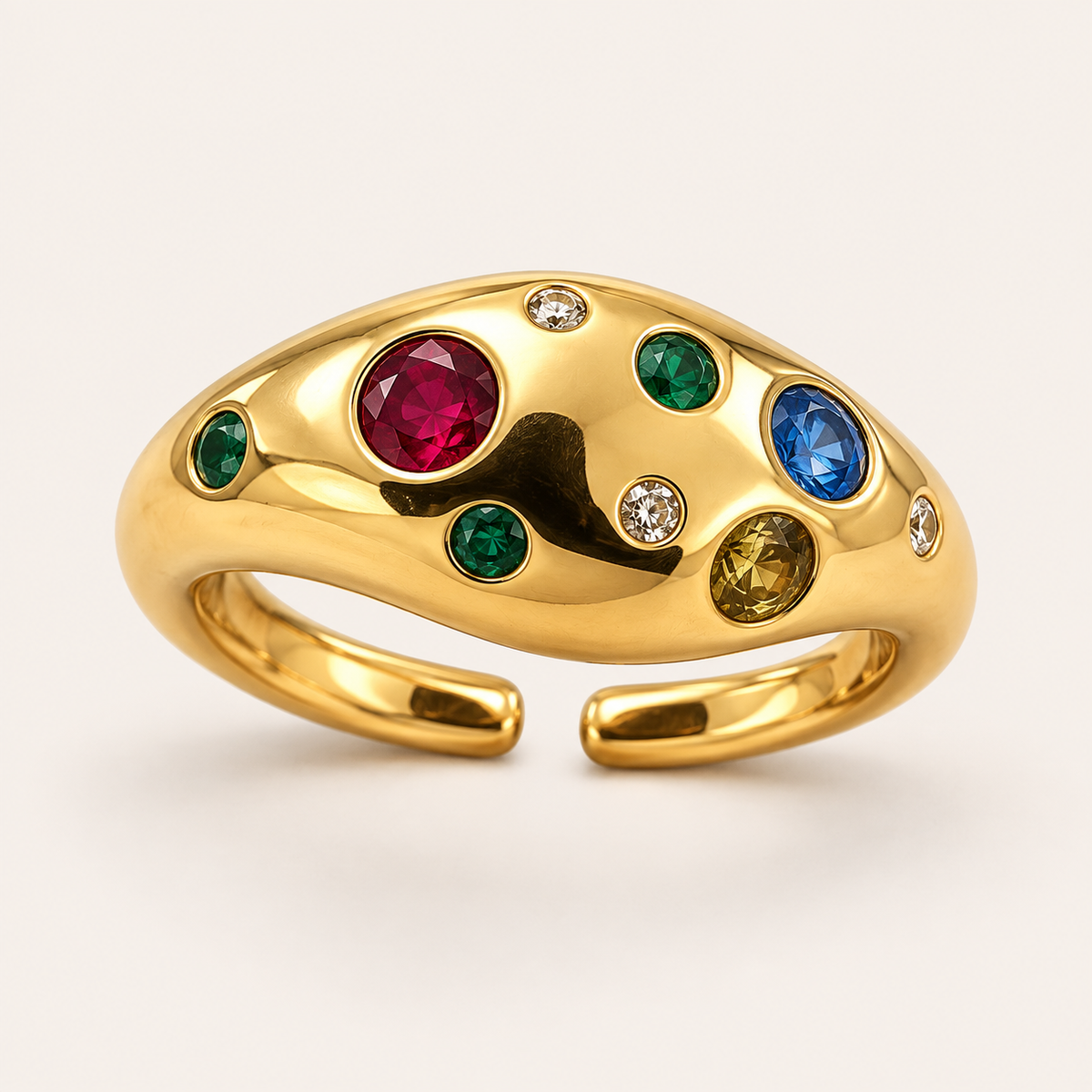 Confetti Dome Ring detail, red, green, blue and amber stones set flush into a gold dome